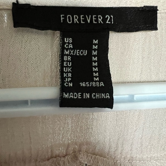 Beige detailed front tie up top. Flared long sleeves, size M from forever 21. - Picture 3 of 6